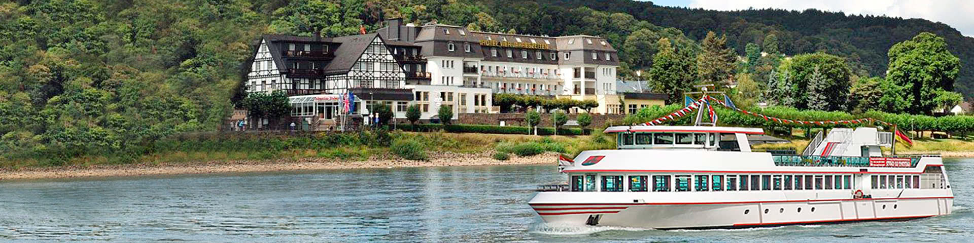 Rheinhotel Vier Jahreszeiten Bad Breisig Außenansicht mit Rhein und Schiff im Vordergrund